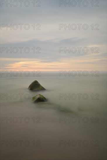 Stones on the west coast of Ruegen at sunset