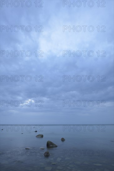 Stones at a Baltic Sea beach at the blue hour