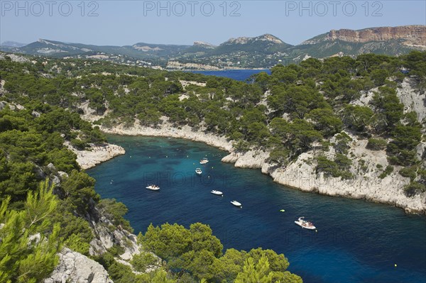 Boats in the rocky bay Calanque de Port-Pin