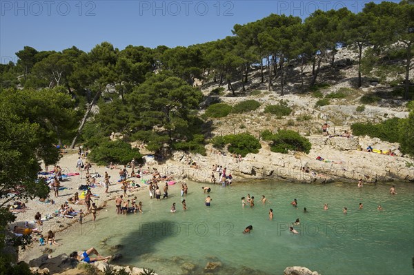 Bathers in the rocky bay Calanque de Port-Pin