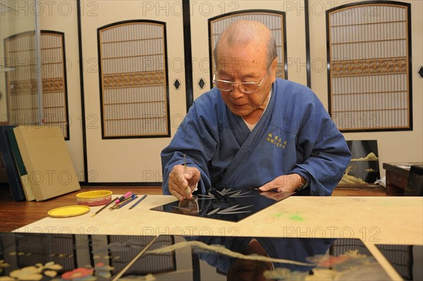 Japanese artisan in his workshop