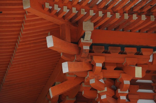 A complicated truss structure under the roof of the gatehouse at the Shimogamo Shrine