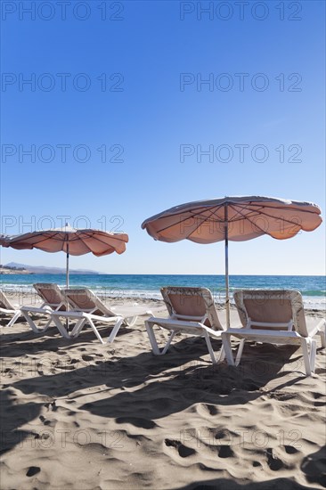 Sun beds and sunshades on the beach