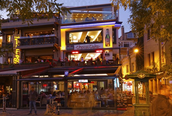 Illuminated restaurants in the evening