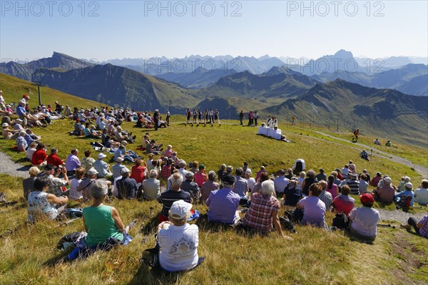 Mountain mass during a meeting of alphorn players