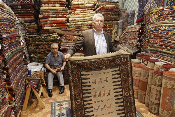 Men in a carpet dealer's store