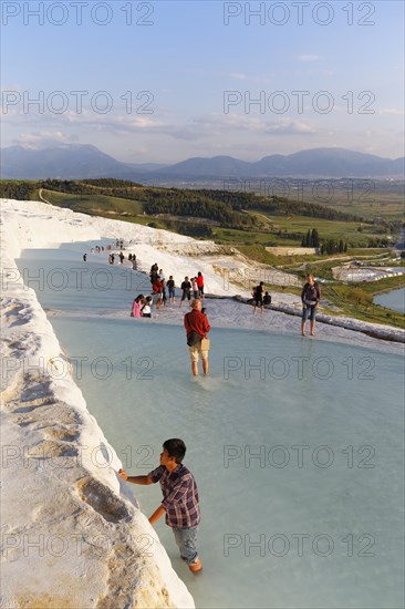 New travertine terraces at Pamukkale on a former road
