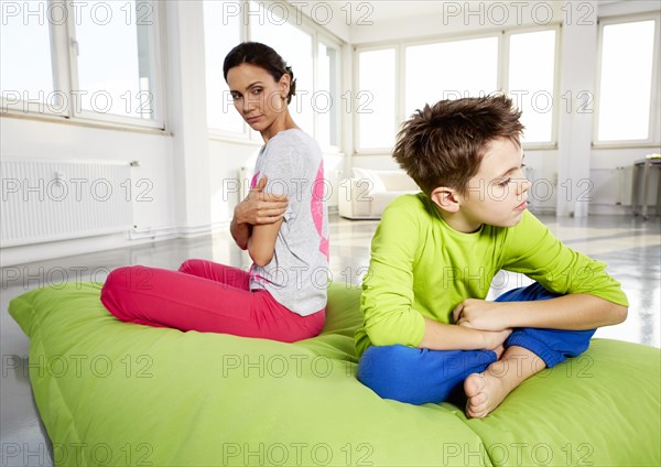 Young woman and son upset