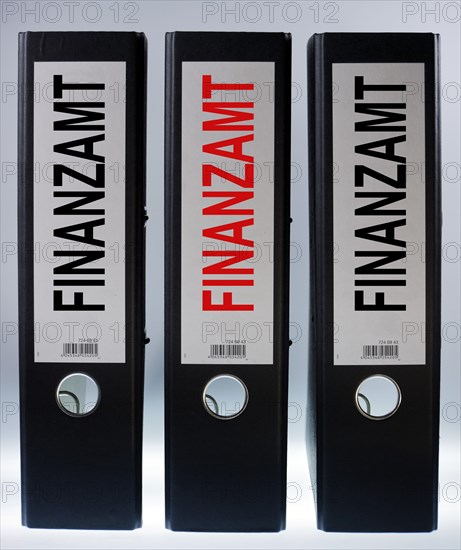 Three file folders labeled 'Finanzamt'
