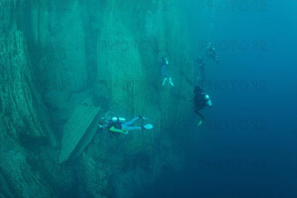 Scuba divers in Barracuda Lake