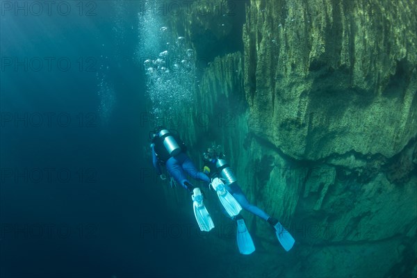 Scuba divers in Barracuda Lake