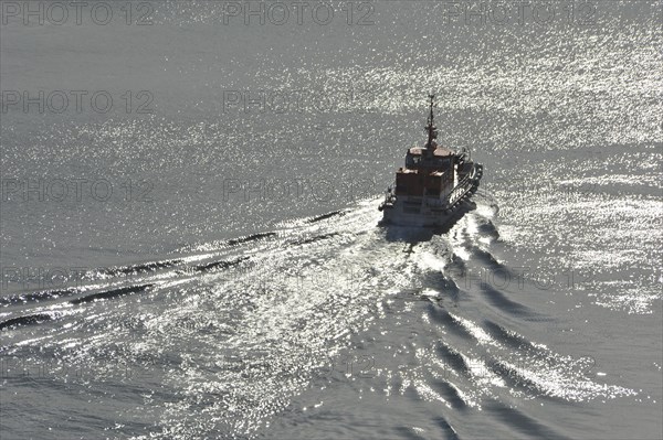 Boat on wavy water