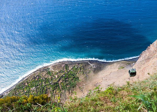 Cable car on the cliff coast of Santa Maria Madalena