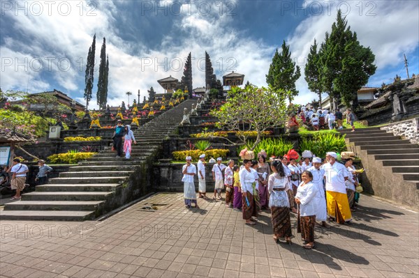 Worshippers gathering at the sacred temple of Pura Penetaran Agung Besakih