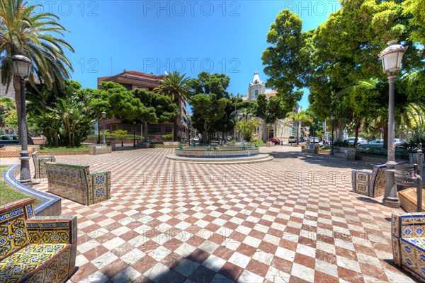 Azulejos benches on Plaza de los Patos square and Plaza 25 de Julio