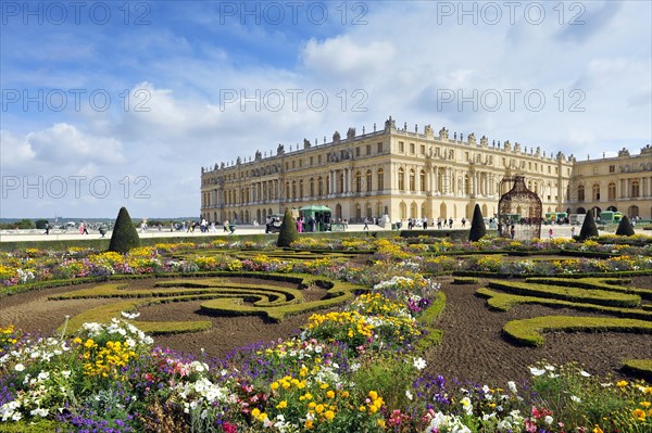 Palace of Versailles with the gardens Parterre du Midi