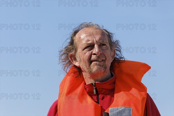 Boater with a life jacket