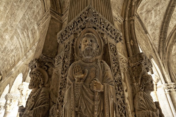 Cornerstone with statues of St. Trophimus in the cloister