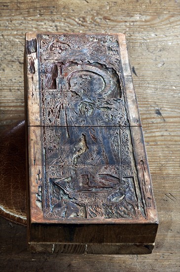Relief printing plate made of wood with a Christian motif by Duerer