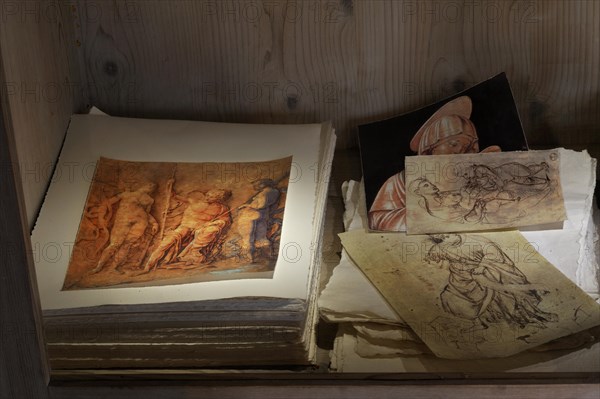 Copies of prints and drawings by Albrecht Duerer in a display case