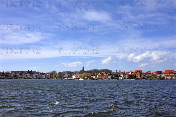 Townscape of the island town of Malchow and Malchow Lake