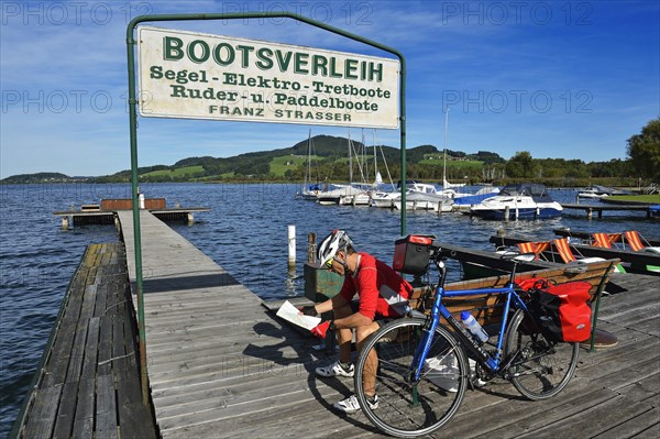 Cyclist at Obertrumer See lake