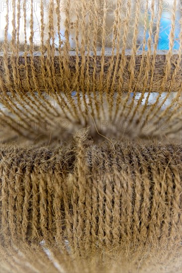 Making ropes from coconut fibres in a small business