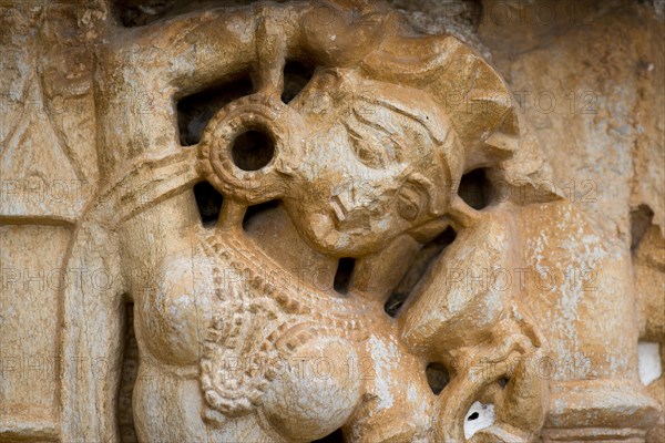 Female stone sculpture