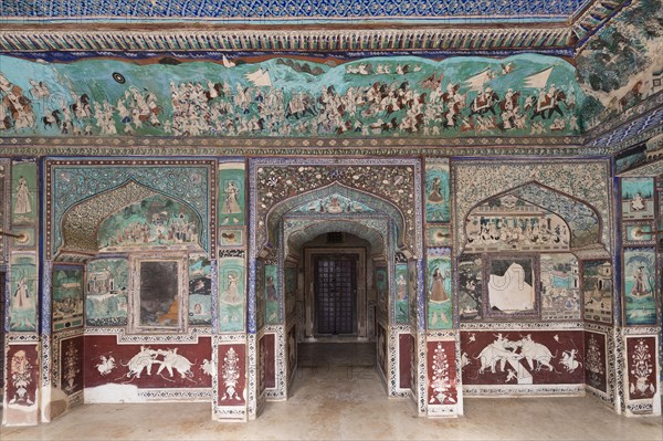 Wall paintings or frescoes painted with natural colours from the Bundikalam school of painting
