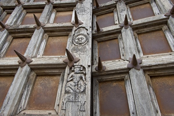 Palace gate fortified with iron spikes