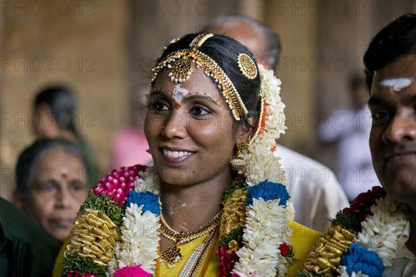 Smiling bride in Meenakshi Amman Temple or Sri Meenakshi Sundareswarar Temple