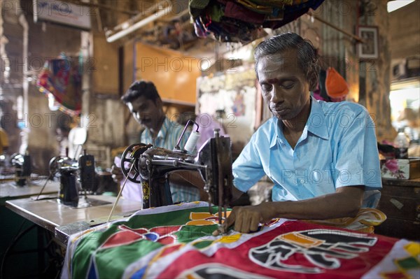 Tailor in a former building of Meenakshi Amman Temple or Sri Meenakshi Sundareswarar Temple