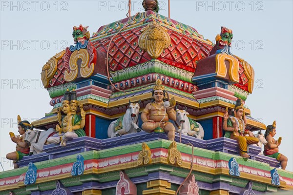 Figures of gods on a Gopuram or gate of a Hindu temple