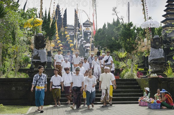 Pilgrims at the decorated Besakih Temple and pilgrimage shrine at the foot of Mount Agung