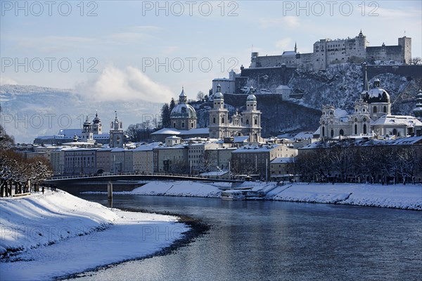 Historic architecture of Salzburg with Festung Hohensalzburg Fortress in winter