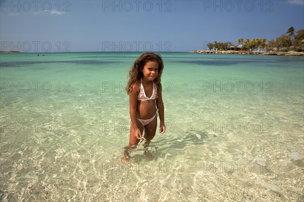 Little Cuban girl on Playa Bacuranao beach