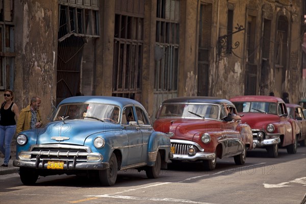 American classic cars from the '50s and colourful facades