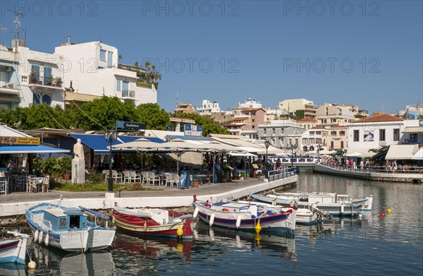 Fishing boats and restaurants on lake Voulismeni