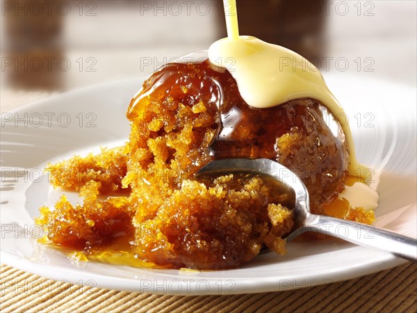 Sticky toffee sponge pudding and custard