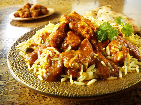 Chicken Madras with Pilau rice and Naan bread