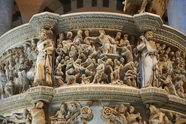 Medieval sculptural reliefs on the pulpit inside the Duomo