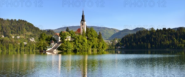 Cerkev Marijinega vnebovzetja or Assumption Church on Bled Island in the middle of Lake Bled