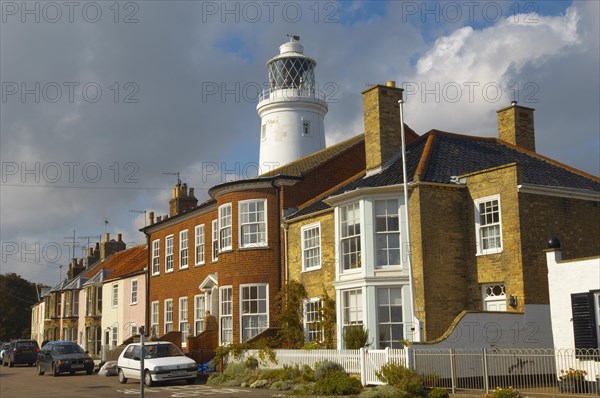 Lighthouse and sea front houses