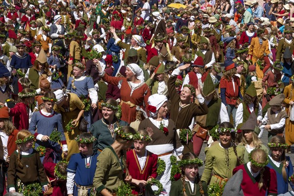 Women and girls cheering