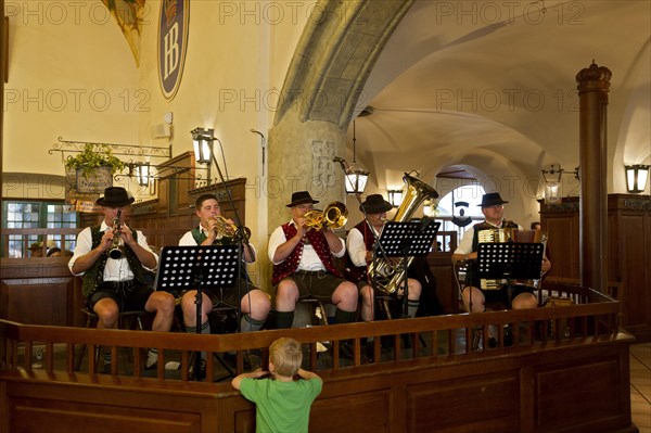 Marching band performing in the 'Schwemme'