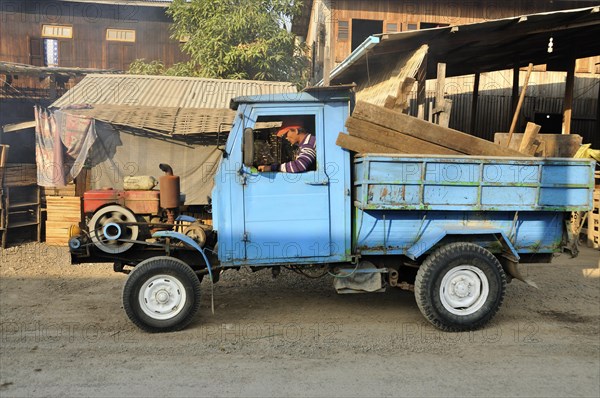 Old lorry with open engine