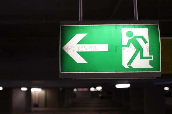 Emergency exit sign in a parking garage