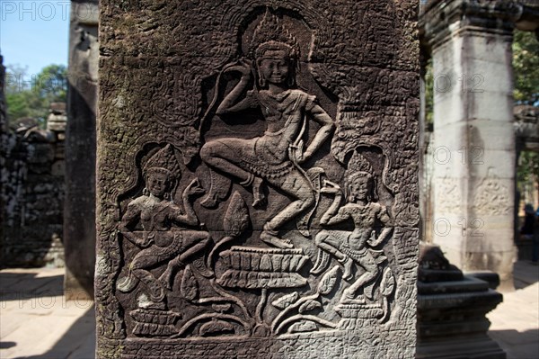 Stone relief with dancing girls in the temple complex of Bayon