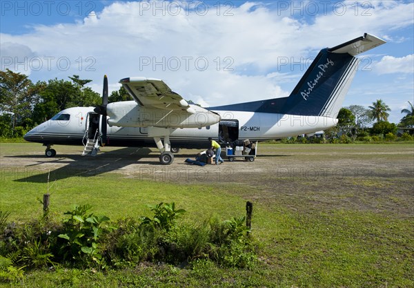 Airplane on the very small Seghe airport