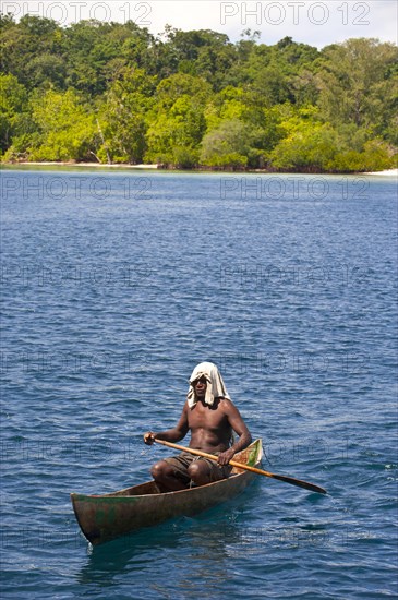Man paddling in his canoe